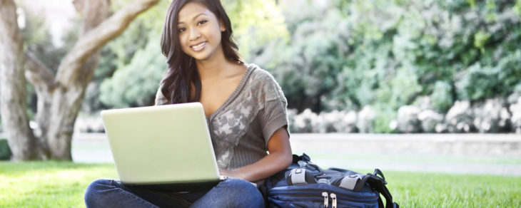 young-female-college-student-on-laptop